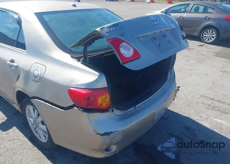 2009 Toyota Corolla Le z USA, uszkodzony, nr VIN 1NXBU40E09Z045344